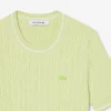 Maglione a maniche corte con lavorazione a trecce Maglione a maniche corte con lavorazione a trecce
