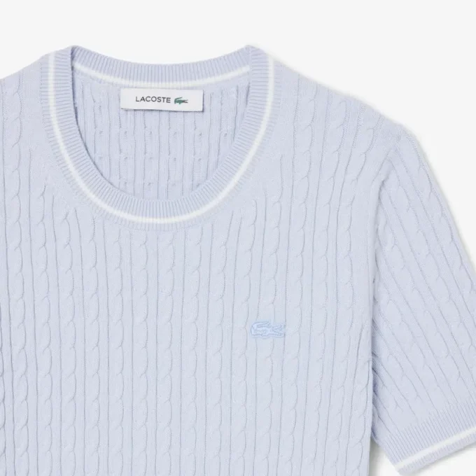 Maglione a maniche corte con lavorazione a trecce Maglione a maniche corte con lavorazione a trecce