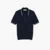 Maglione a righe con collo a polo e lavorazione a trecce Maglione a righe con collo a polo e lavorazione a trecce