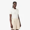 Maglione a righe con collo a polo e lavorazione a trecce Maglione a righe con collo a polo e lavorazione a trecce