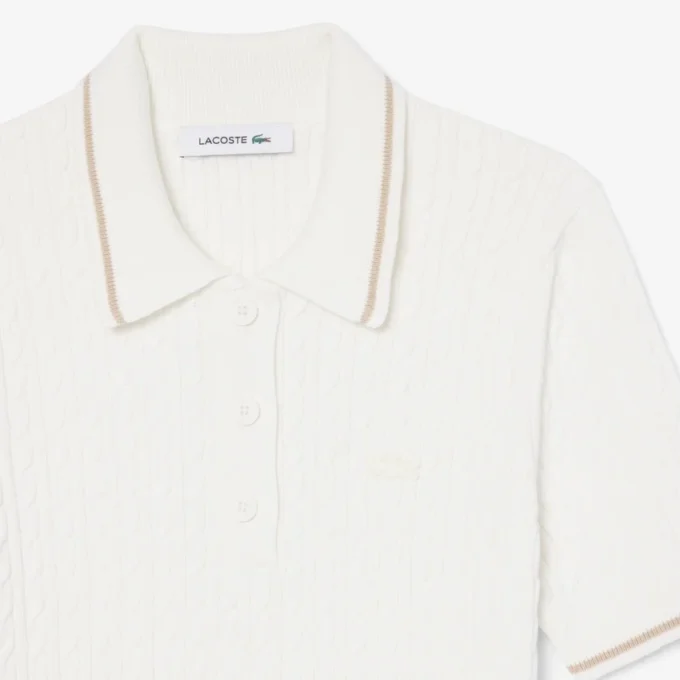 Maglione a righe con collo a polo e lavorazione a trecce Maglione a righe con collo a polo e lavorazione a trecce