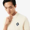Maglione con colletto Polo e badge “Made in France” Maglione con colletto Polo e badge “Made in France”