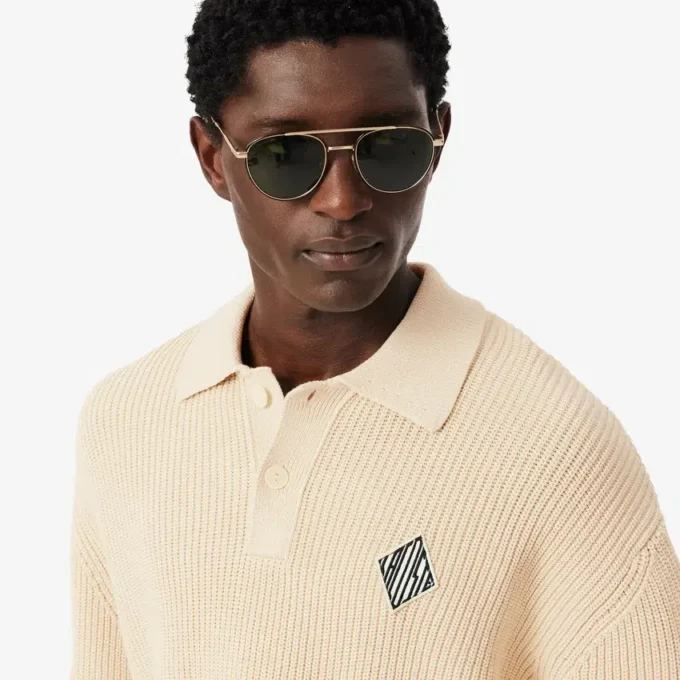 Maglione con collo a polo a coste perlate e dettaglio badge Maglione con collo a polo a coste perlate e dettaglio badge