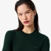 Maglione da donna a maniche corte in maglia a coste di lana merino Maglione da donna a maniche corte in maglia a coste di lana merino
