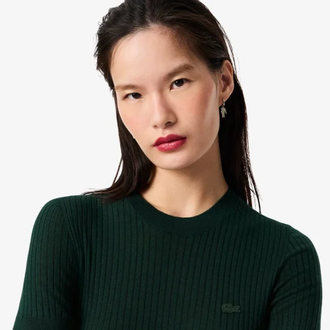 Maglione da donna a maniche corte in maglia a coste di lana merino Maglione da donna a maniche corte in maglia a coste di lana merino