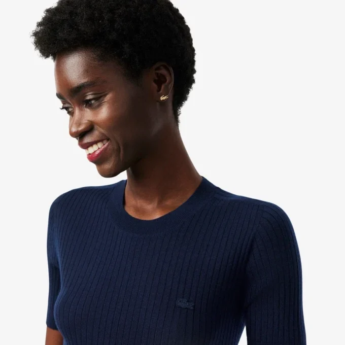 Maglione da donna a maniche corte in maglia a coste di lana merino Maglione da donna a maniche corte in maglia a coste di lana merino