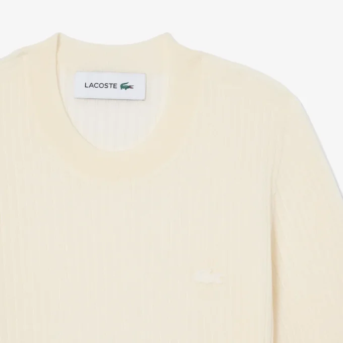 Maglione da donna a maniche corte in maglia a coste di lana merino Maglione da donna a maniche corte in maglia a coste di lana merino