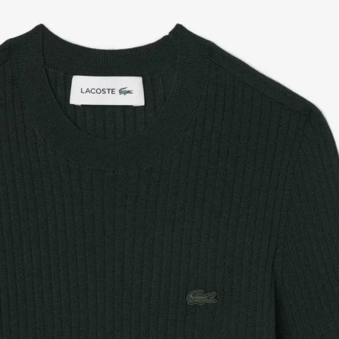 Maglione da donna a maniche corte in maglia a coste di lana merino Maglione da donna a maniche corte in maglia a coste di lana merino