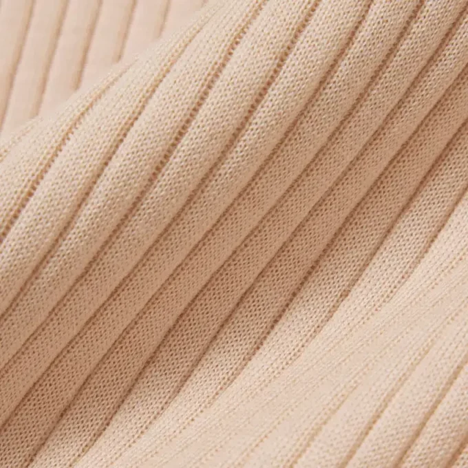 Maglione da donna a maniche corte in maglia a coste di lana merino Maglione da donna a maniche corte in maglia a coste di lana merino