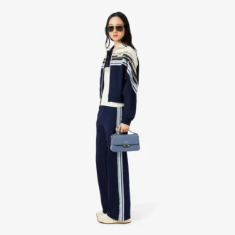Maglione da donna con collo a polo a righe, prodotto in Francia