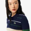 Maglione da donna con collo a polo a righe, prodotto in Francia Maglione da donna con collo a polo a righe, prodotto in Francia