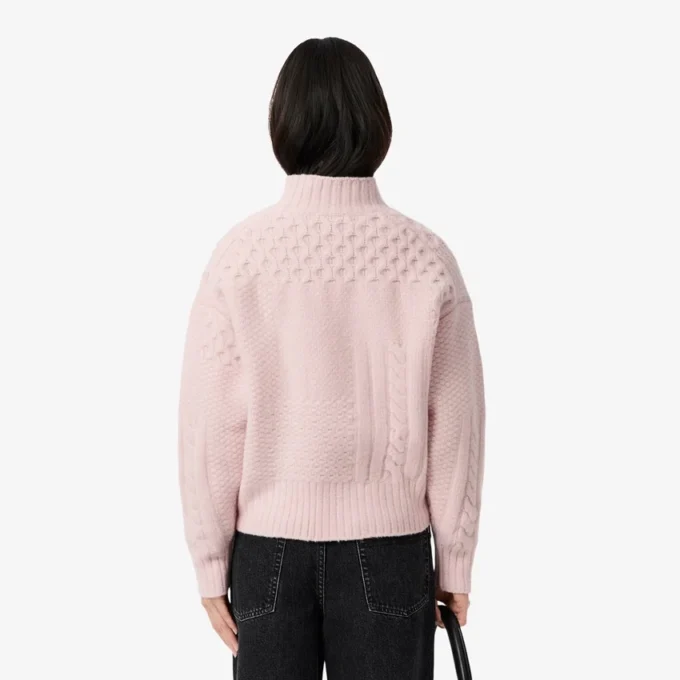 Maglione da donna in lana a collo alto con effetto patchwork Maglione da donna in lana a collo alto con effetto patchwork