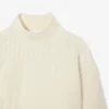 Maglione da donna in lana a collo alto con effetto patchwork Maglione da donna in lana a collo alto con effetto patchwork