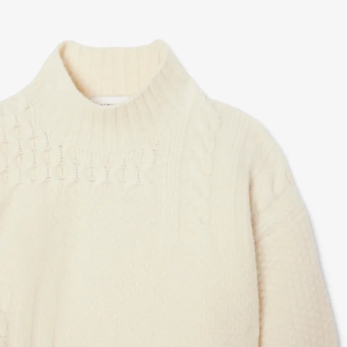Maglione da donna in lana a collo alto con effetto patchwork Maglione da donna in lana a collo alto con effetto patchwork
