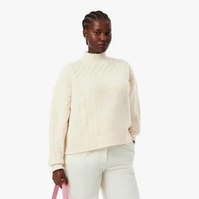 Maglione da donna in lana a collo alto con effetto patchwork Maglione da donna in lana a collo alto con effetto patchwork
