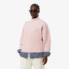 Maglione da donna in lana a collo alto con effetto patchwork Maglione da donna in lana a collo alto con effetto patchwork