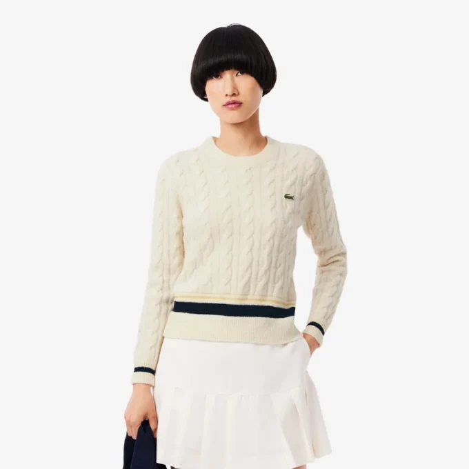 Maglione da donna in lana a trecce Maglione da donna in lana a trecce