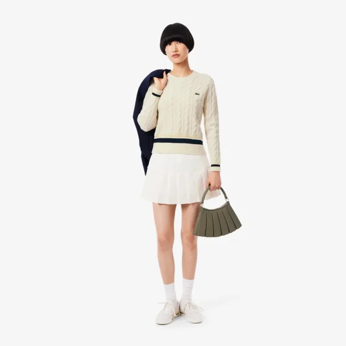 Maglione da donna in lana a trecce Maglione da donna in lana a trecce