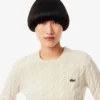 Maglione da donna in lana a trecce Maglione da donna in lana a trecce