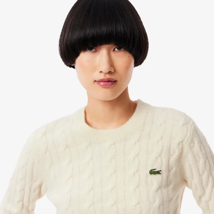 Maglione da donna in lana a trecce Maglione da donna in lana a trecce