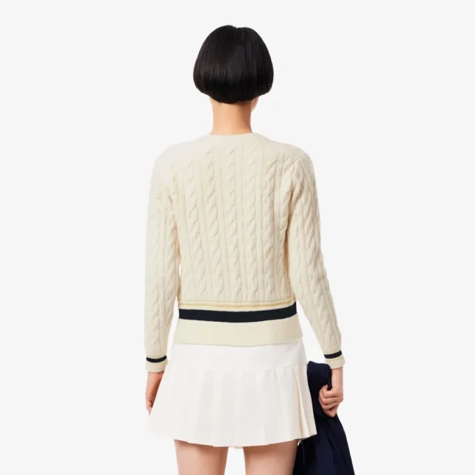Maglione da donna in lana a trecce Maglione da donna in lana a trecce