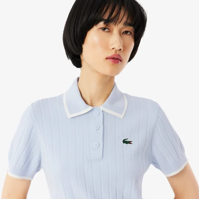 Maglione da golf da donna a maniche corte con collo a polo Maglione da golf da donna a maniche corte con collo a polo