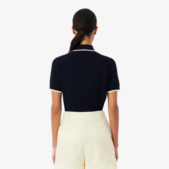Maglione da golf da donna a maniche corte con collo a polo Maglione da golf da donna a maniche corte con collo a polo