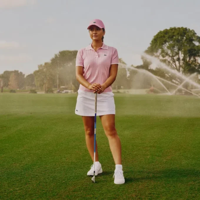 Maglione da golf da donna a maniche corte con collo a polo Maglione da golf da donna a maniche corte con collo a polo