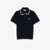 Maglione da golf da donna a maniche corte con collo a polo Maglione da golf da donna a maniche corte con collo a polo
