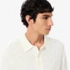 Maglione da uomo in maglia a costine fluida con collo a polo Maglione da uomo in maglia a costine fluida con collo a polo