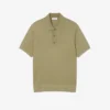 Maglione da uomo in maglia a costine fluida con collo a polo Maglione da uomo in maglia a costine fluida con collo a polo