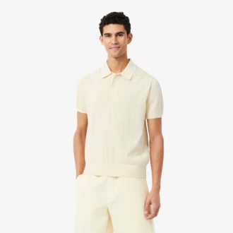 Maglione fluido a costine con collo a polo