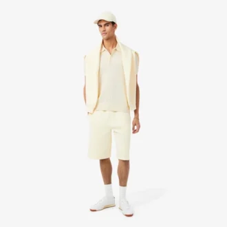 Maglione fluido a costine con collo a polo