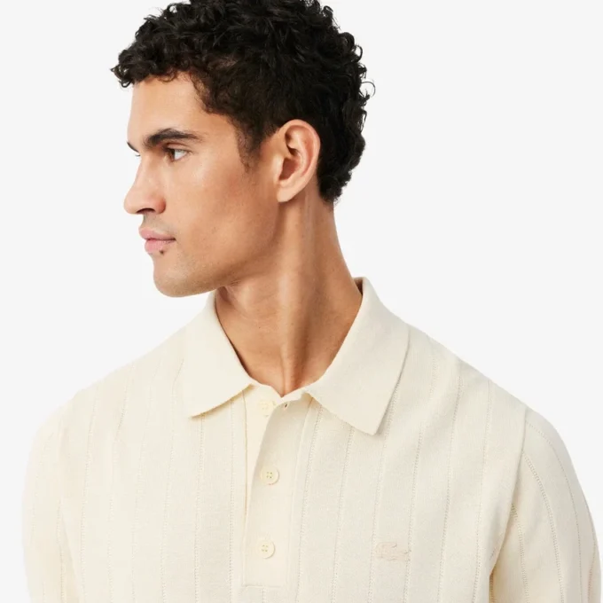 Maglione fluido a costine con collo a polo Maglione fluido a costine con collo a polo