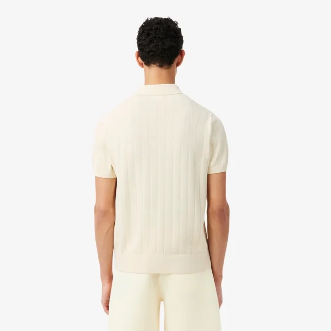 Maglione fluido a costine con collo a polo Maglione fluido a costine con collo a polo