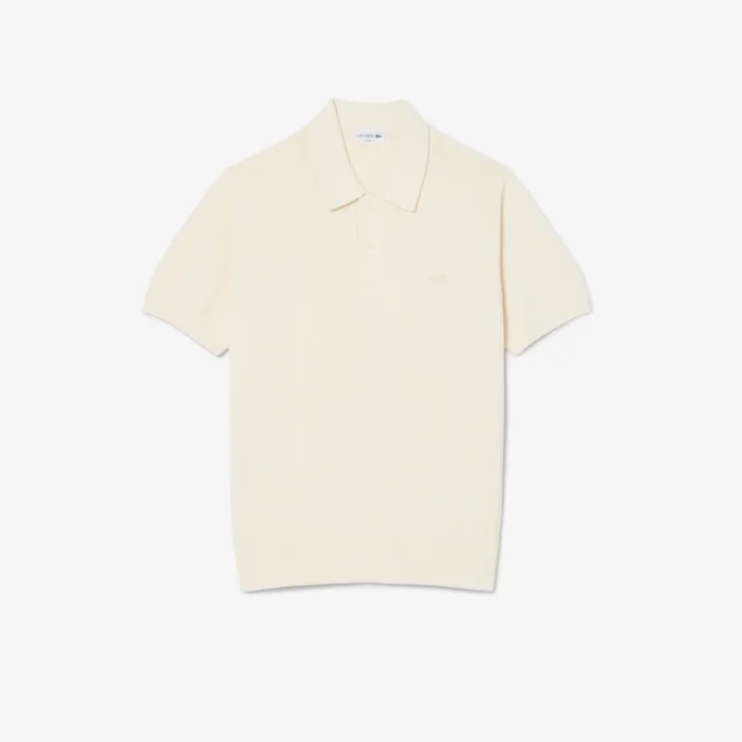 Maglione fluido a costine con collo a polo Maglione fluido a costine con collo a polo