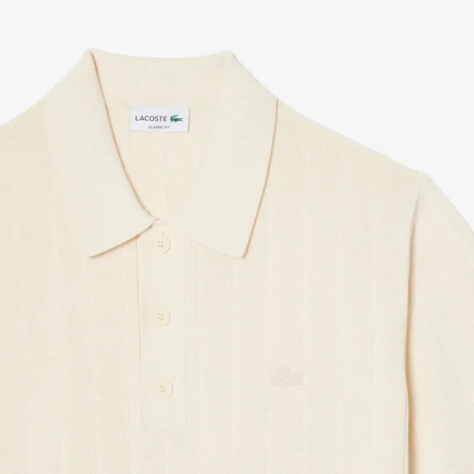 Maglione fluido a costine con collo a polo Maglione fluido a costine con collo a polo