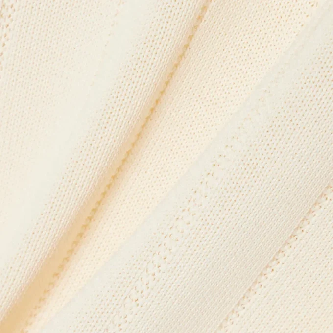 Maglione fluido a costine con collo a polo Maglione fluido a costine con collo a polo