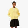 Maglione in cotone con zip e badge Maglione in cotone con zip e badge