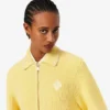 Maglione in cotone con zip e badge Maglione in cotone con zip e badge