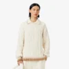 Maglione in lana con collo polo e lavorazione a trecce Maglione in lana con collo polo e lavorazione a trecce