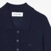 Maglione in lana merino con collo a polo e lavorazione a costine 3D Maglione in lana merino con collo a polo e lavorazione a costine 3D