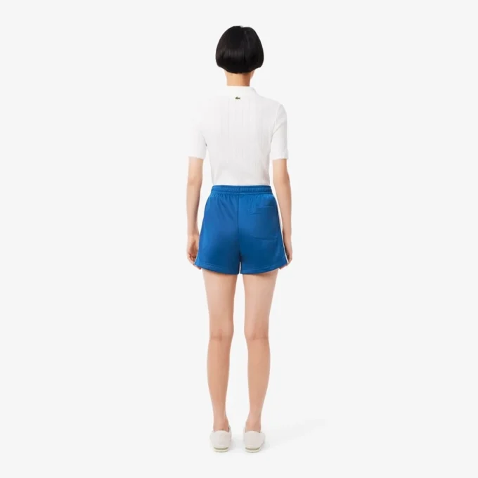 Pantaloncini da donna in jersey satinato a righe pointelle Pantaloncini da donna in jersey satinato a righe pointelle