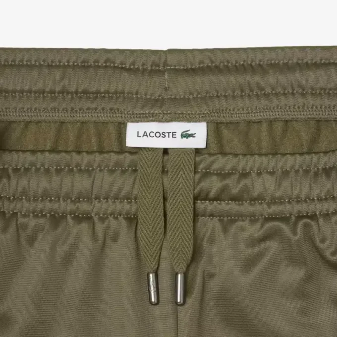 Pantaloncini da donna in jersey satinato a righe pointelle Pantaloncini da donna in jersey satinato a righe pointelle