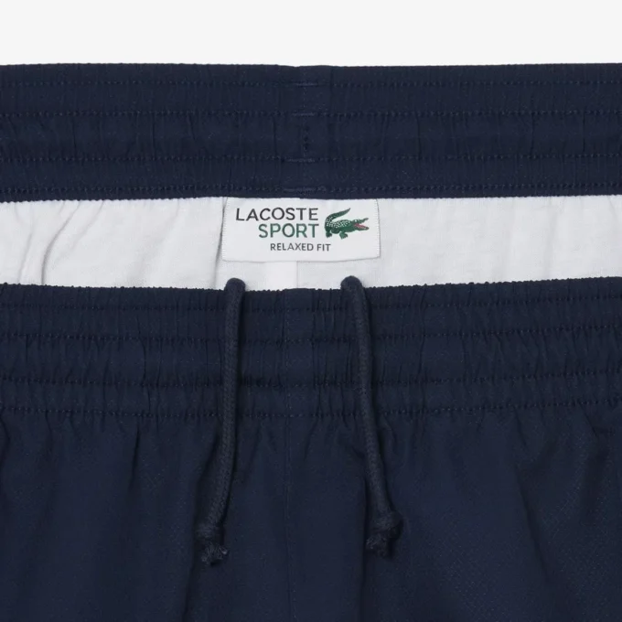Pantaloncini da tennis da uomo leggeri a righe color block Pantaloncini da tennis da uomo leggeri a righe color block