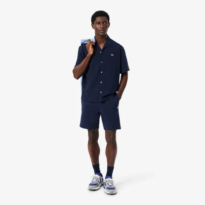 Pantaloncini in pile con strisce e logo, vestibilità regolare Pantaloncini in pile con strisce e logo, vestibilità regolare