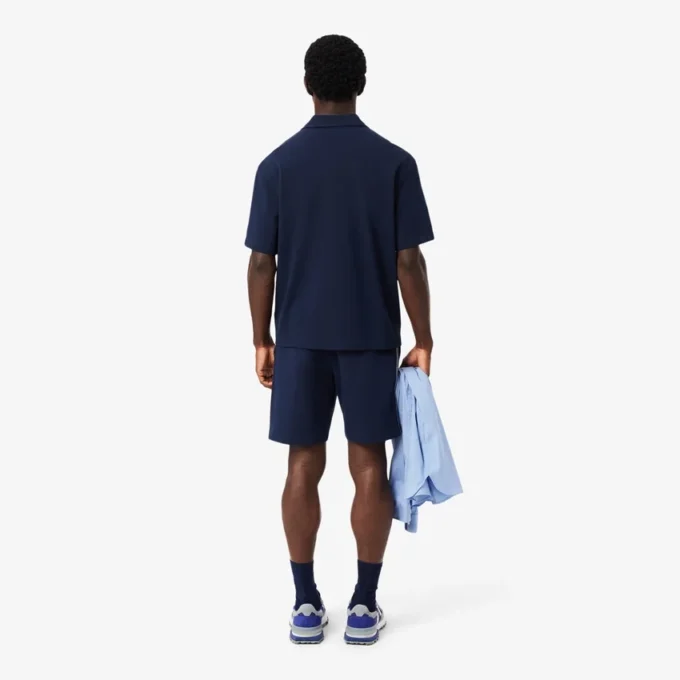 Pantaloncini in pile con strisce e logo, vestibilità regolare Pantaloncini in pile con strisce e logo, vestibilità regolare
