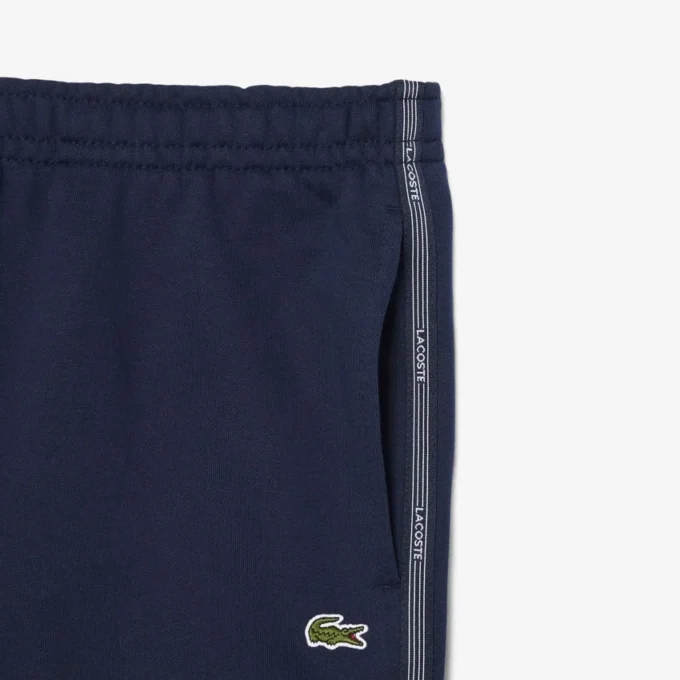 Pantaloncini in pile con strisce e logo, vestibilità regolare Pantaloncini in pile con strisce e logo, vestibilità regolare