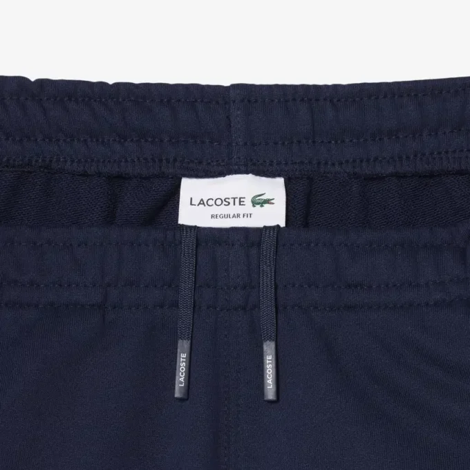 Pantaloncini in pile con strisce e logo, vestibilità regolare Pantaloncini in pile con strisce e logo, vestibilità regolare