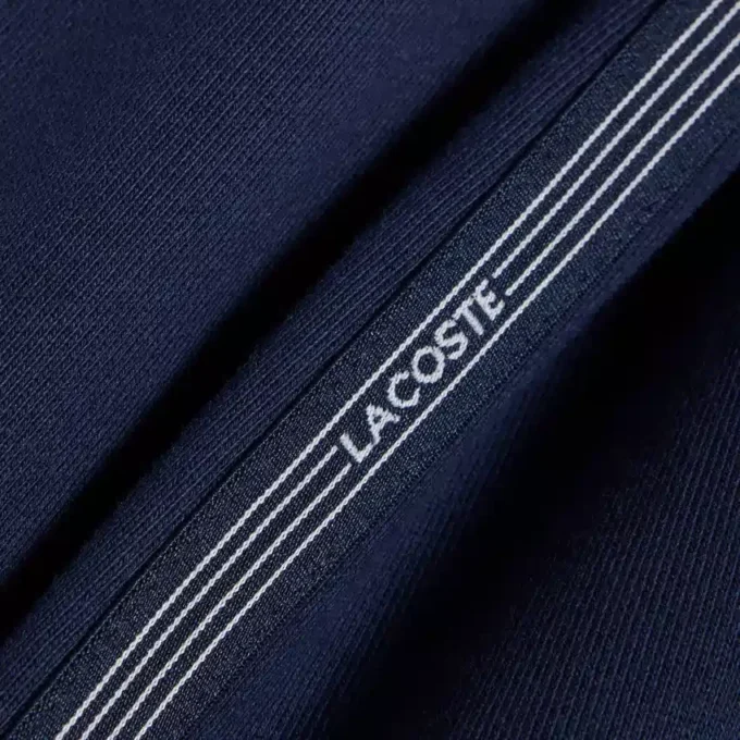 Pantaloncini in pile con strisce e logo, vestibilità regolare Pantaloncini in pile con strisce e logo, vestibilità regolare